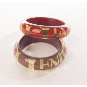 Henri Bendel Jewelry Set of 2 Bangles Golden Logo Resin Bracelet